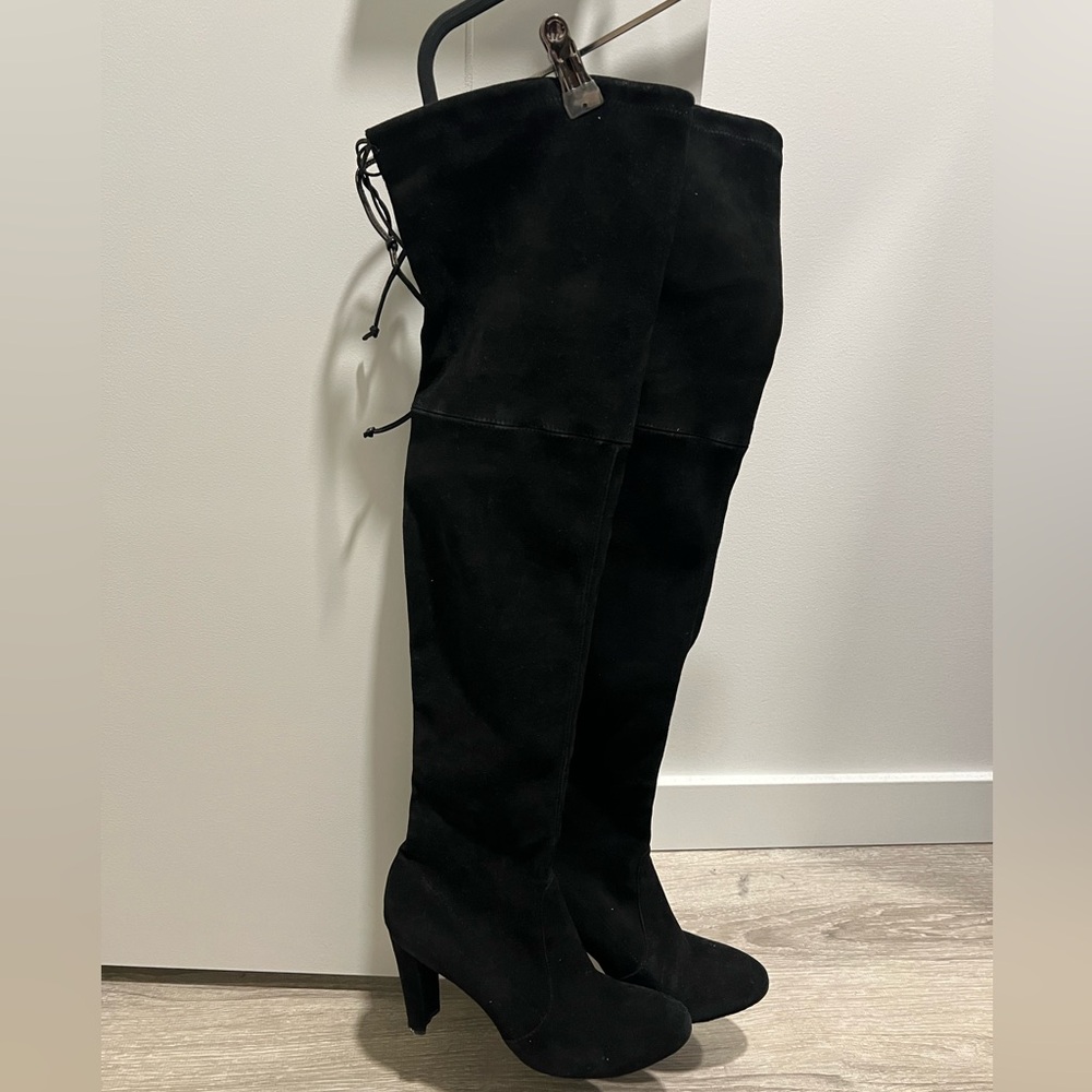 Stuart Weitzman over-the-knee suede boots.